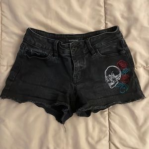 skeleton black low rise jean shorts